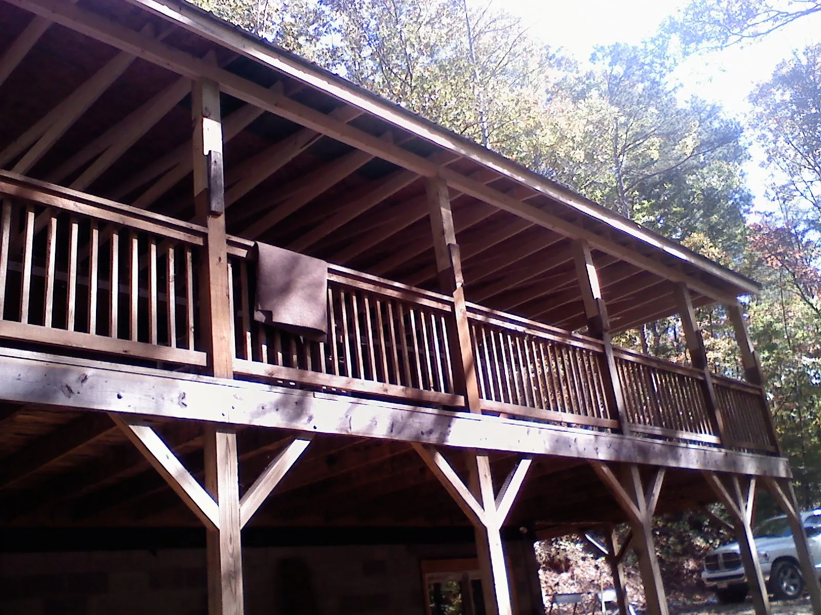 Timber framing under a new elevated porch and deck — Roof Leak Repair in Pueblo by Roofing Brothers